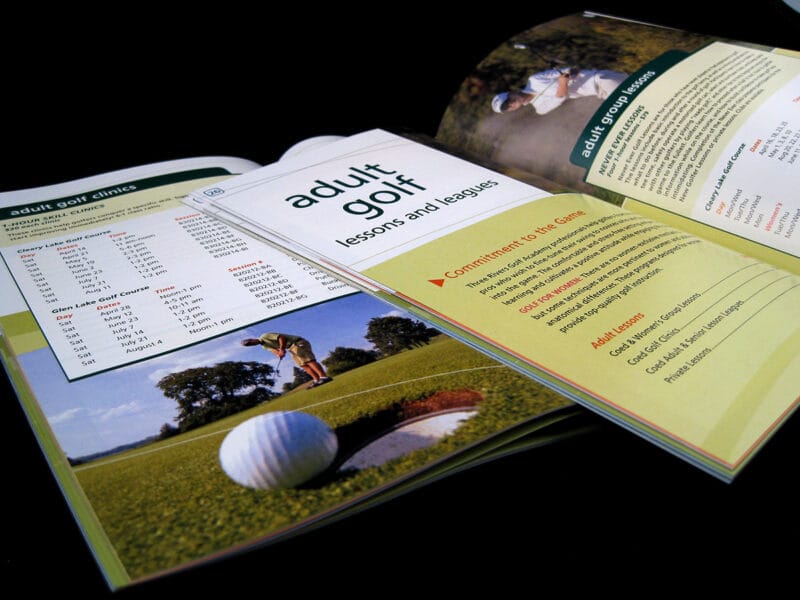 Golf lesson booklet with adult golfer image