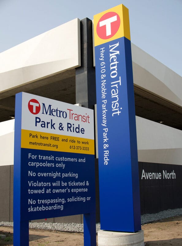 station name sign and rule sign at park & ride entrance