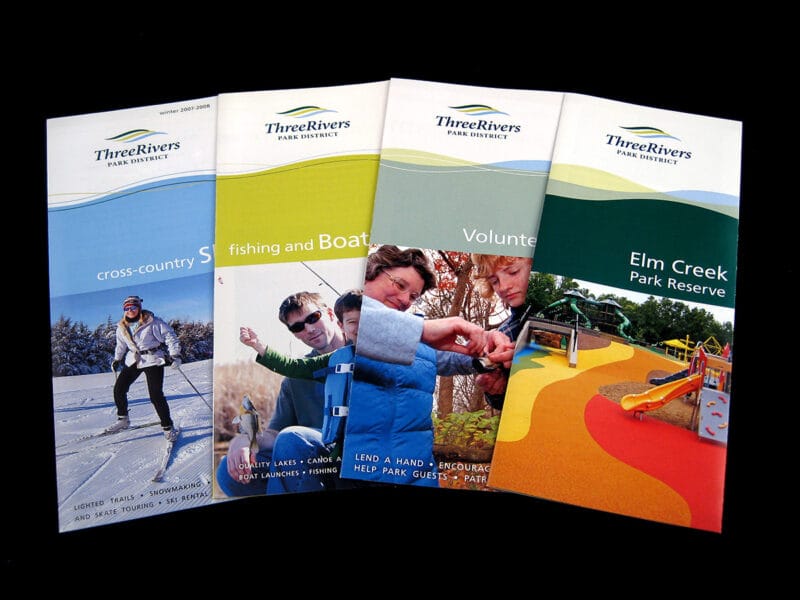Display of similarly branded park activity guides